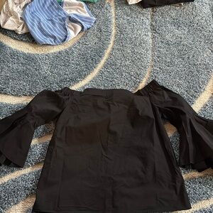 Like new women’s Jennifer Lopez off the shoulder top